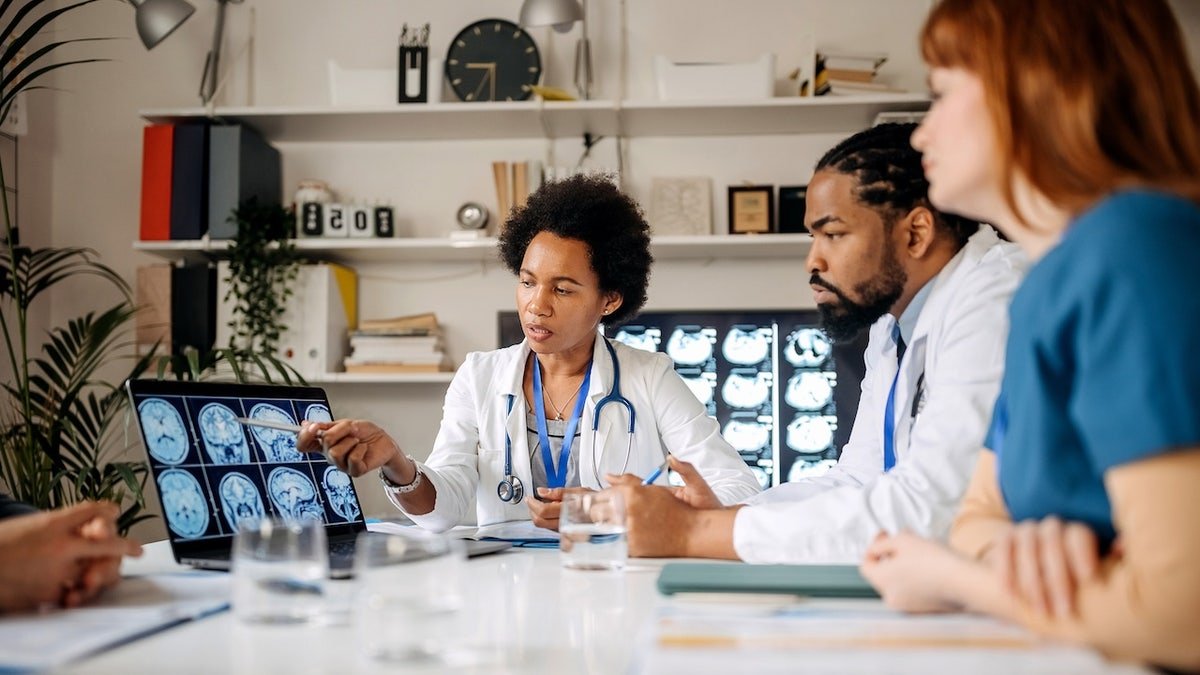 Doctors discussing MRIs