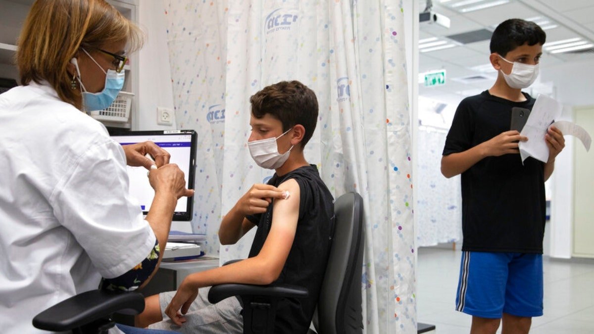 Kids getting vaccine