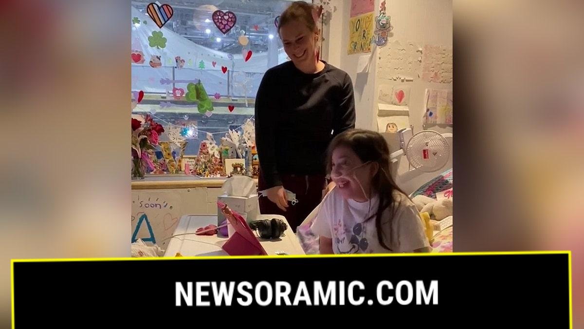 Ava Cooper surprising her father with heart transplant news