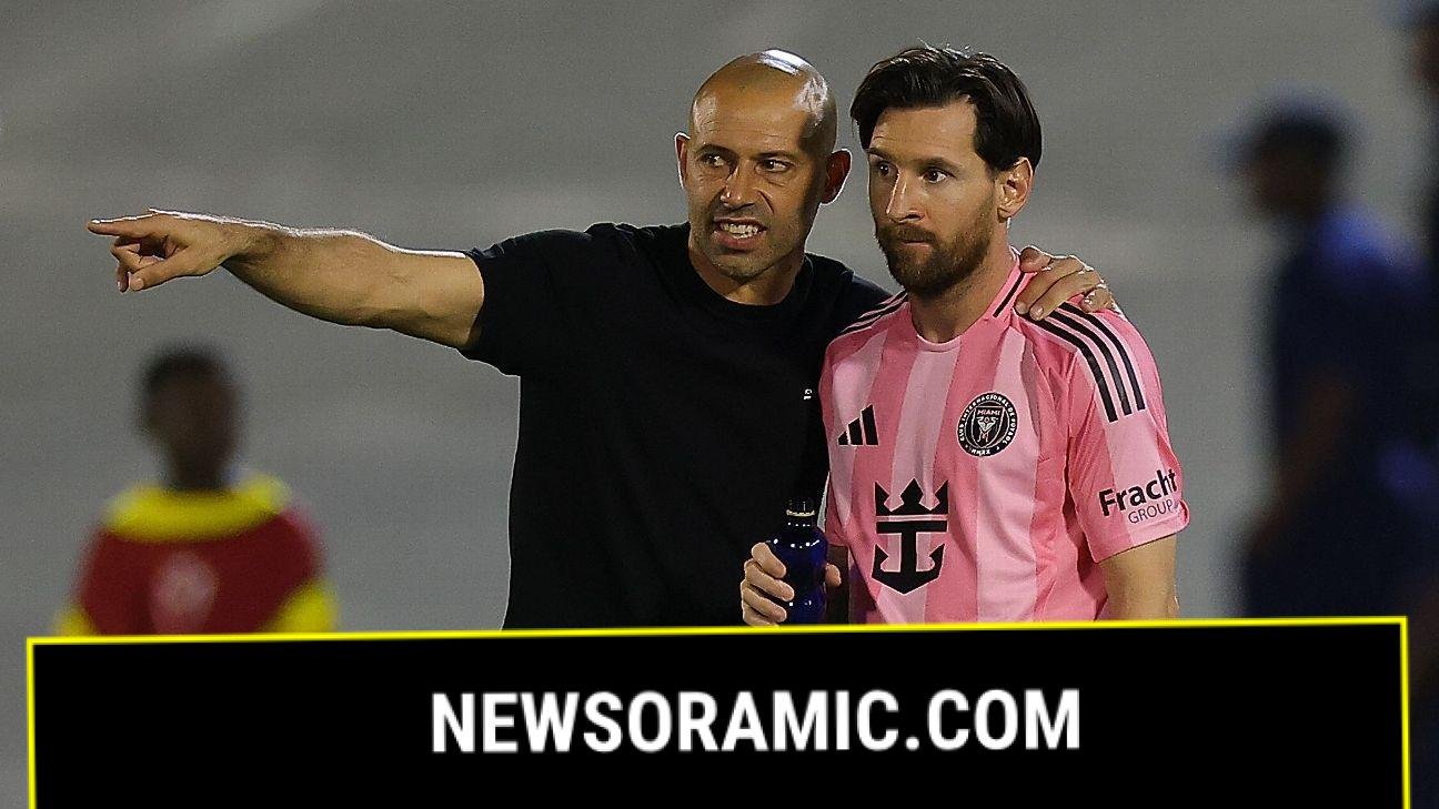 Miami coach defends sitting in stands after red