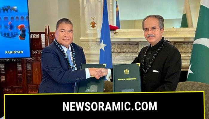 Pakistans Ambassador to the United Nations Asim Iftikhar (right) and Ambassador Jeem S Lippwe sign a joint communiqué to formalise relationship between the two countries on August 14, 2025. — X/@PakistanUN_NY