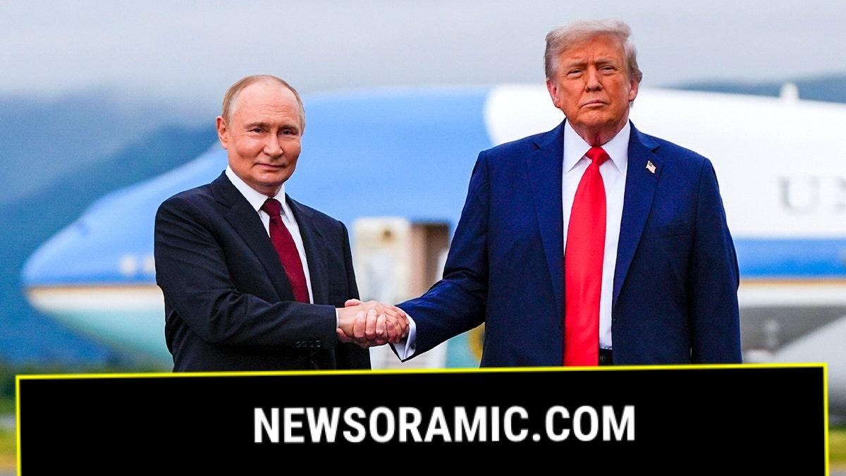 Putin and Trump shake hands