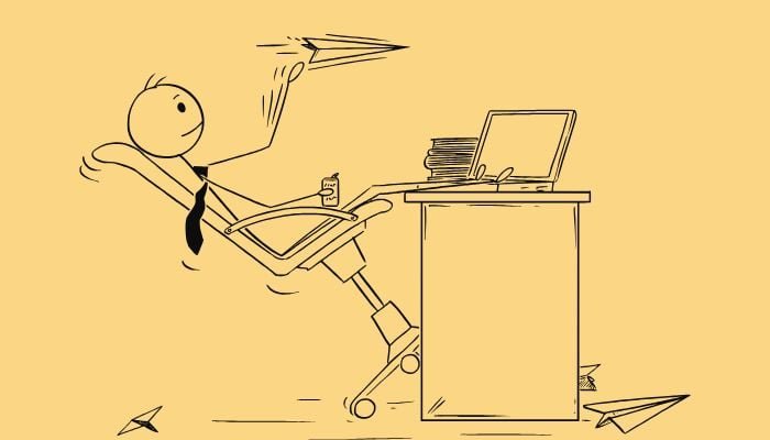 A representational sketch showing a bored person on their desk. — Canva