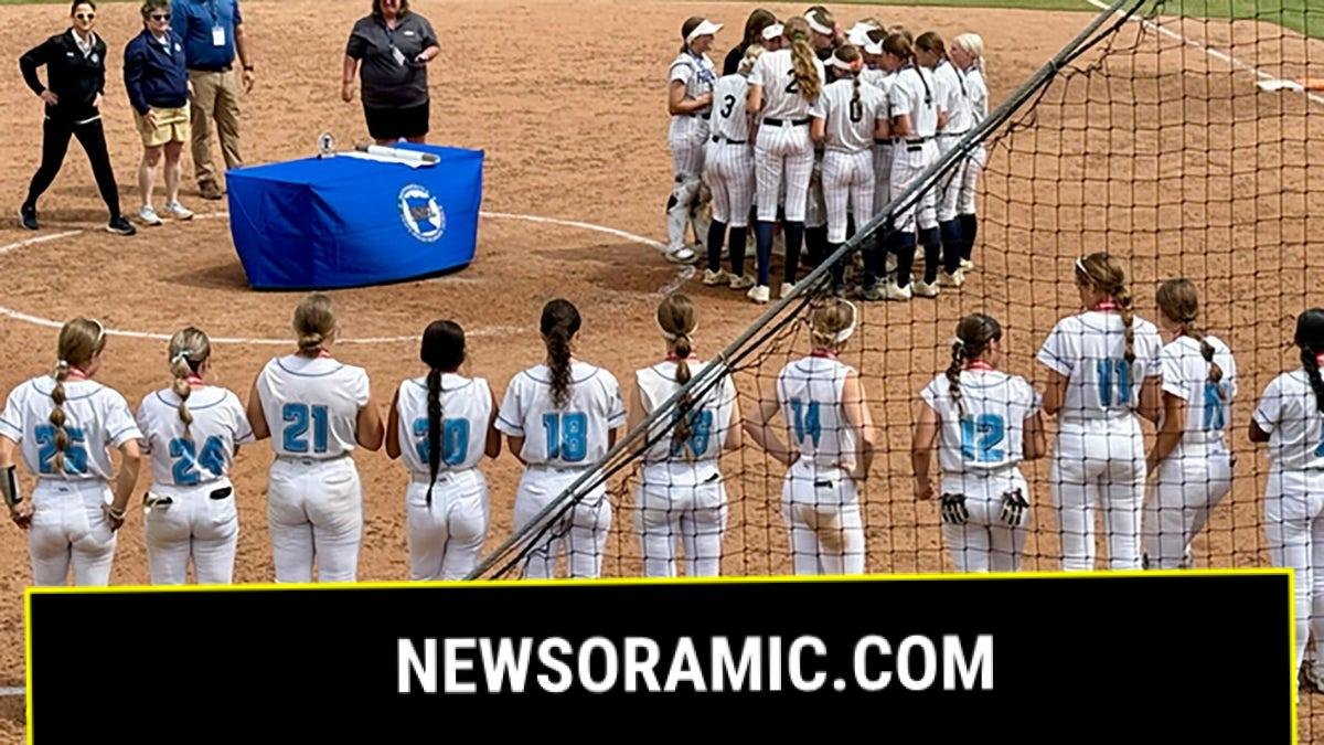 Champlin Park celebrates winning the State Championship while Bloomington Jefferson looks on.