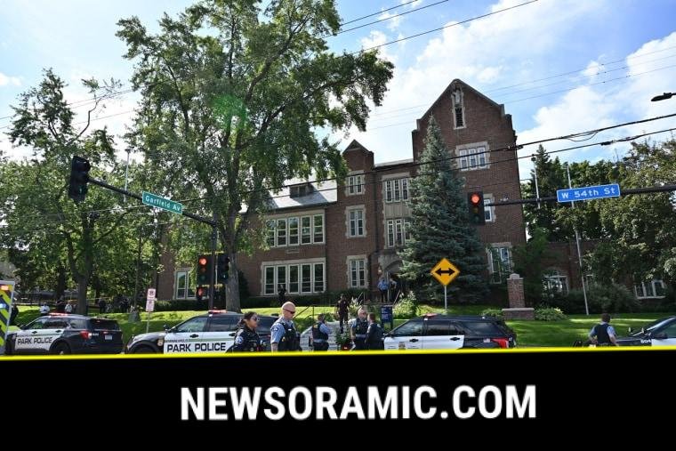 Police and first responders work at the scene of a shooting near Annunciation Church and Catholic School in Minneapolis, Minneosta, on August 27, 2025.