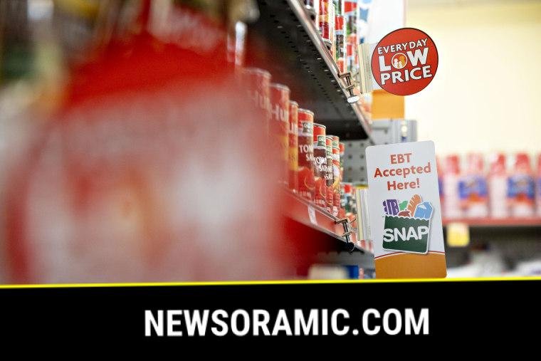 An "EBT Accepted Here" sign at a Family Dollar store.