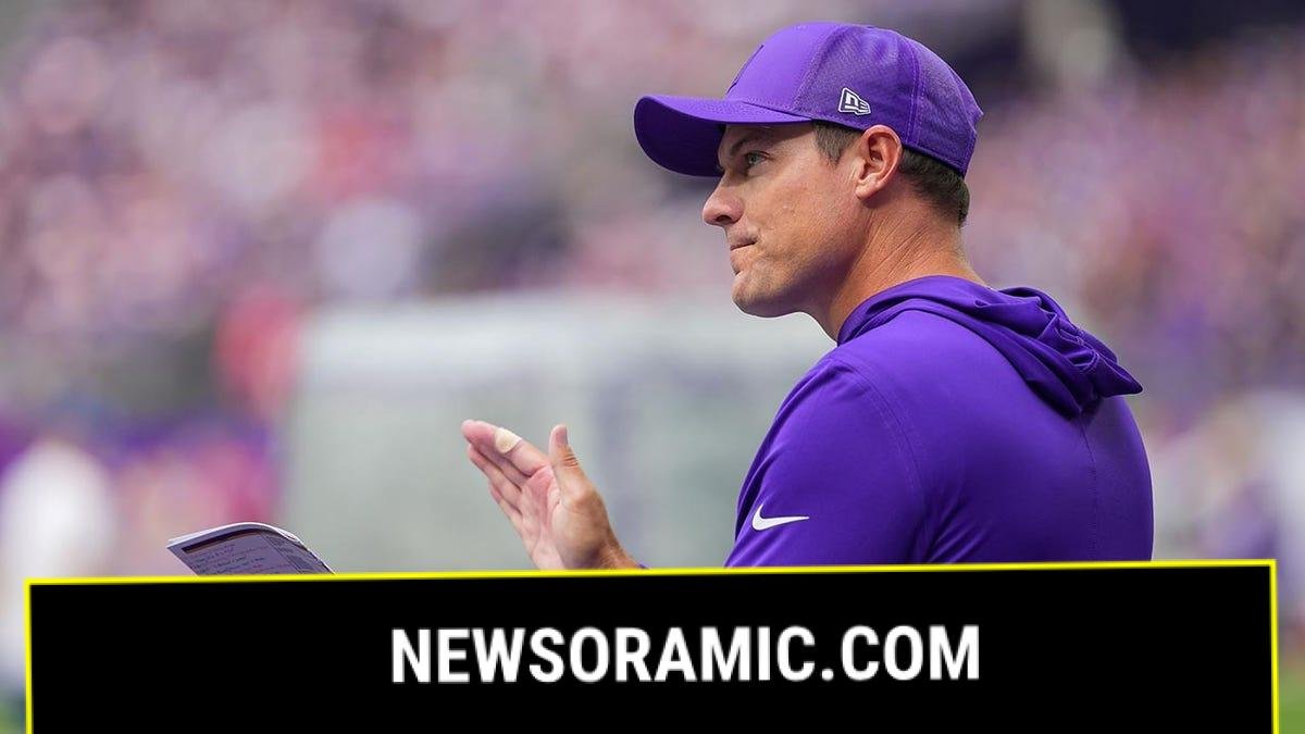 Kevin O'Connell claps on field