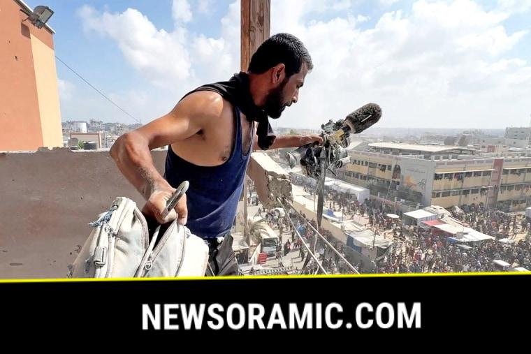 Palestinians inspect the site of Israeli strikes on Nasser Hospital where Reuters contractor was killed, in Khan Younis