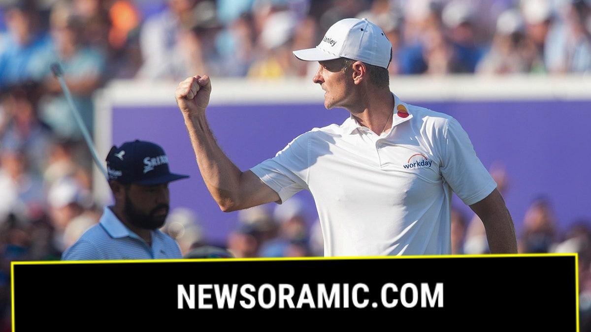 Justin Rose celebrating