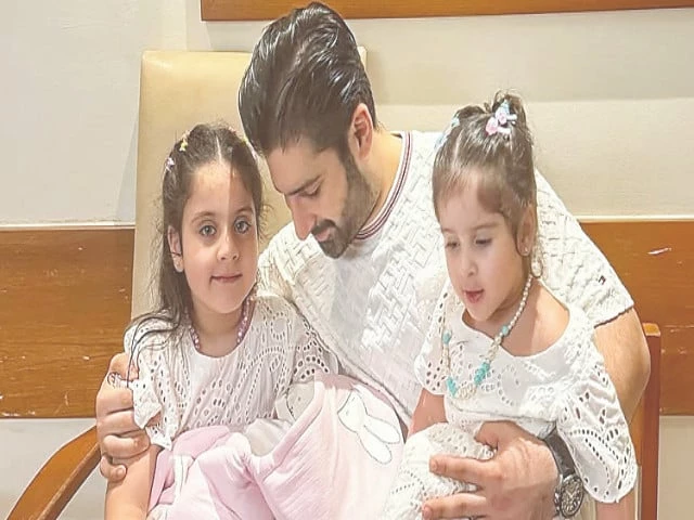 muneeb butt with his three daughters photo instagram