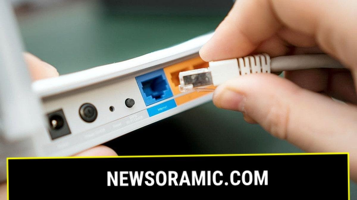 A person sets up their home router.