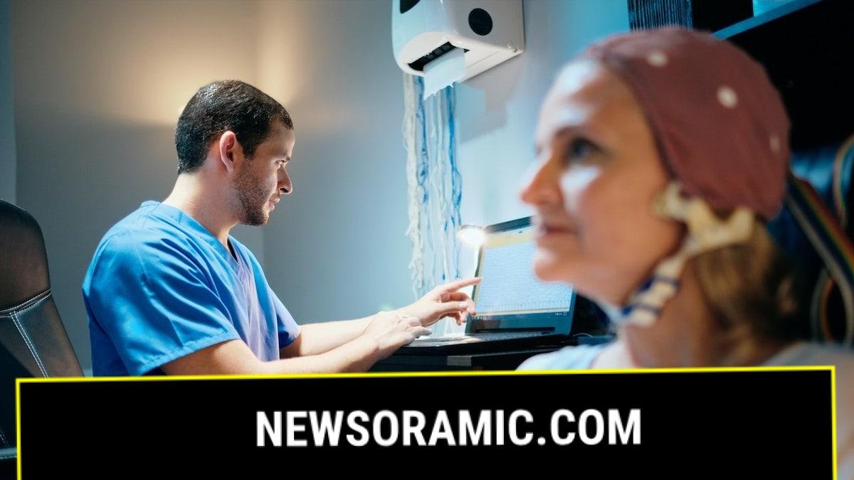 Woman getting EEG test with doctor