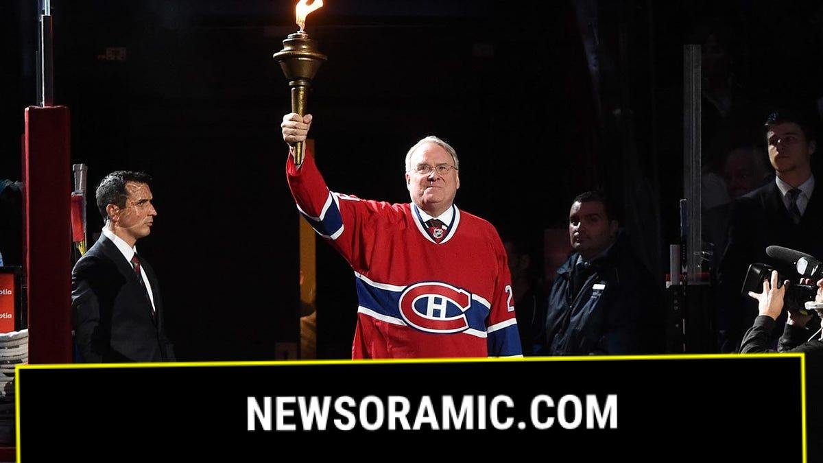 Ken Dryden holding torch