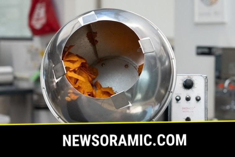 Nacho cheese seasoning made from natural dyes is added to Doritos.