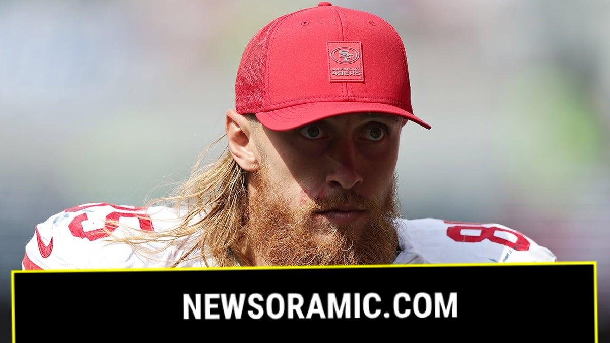 George Kittle looks on field