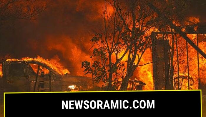 Flames engulf a home and vehicle in Chinese Camp as wildfires rage in Tuolumne County, California, US on September 2, 2025. — Reuters