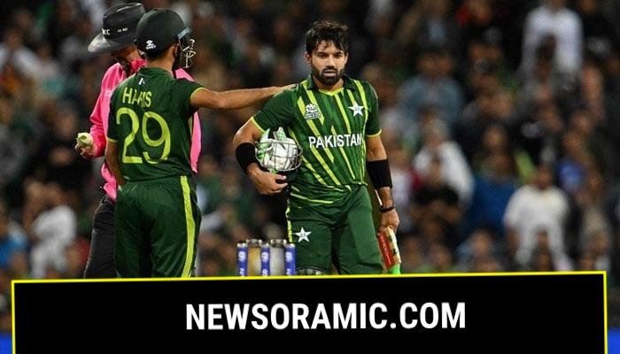Muhammad Rizwan (centre) is consoled by teammate Mohammad Haris as he walks back to the pavilion after his dismissal during the ICC mens T20 World Cup 2022 semi-final match between New Zealand and Pakistan at the Sydney Cricket Ground in Sydney. — AFP/File