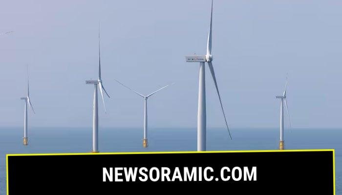 A ship sails between wind turbines in the Taiwan strait off the coast of Pingtan Island, Fujian province, China, April 10, 2023. — Reuters