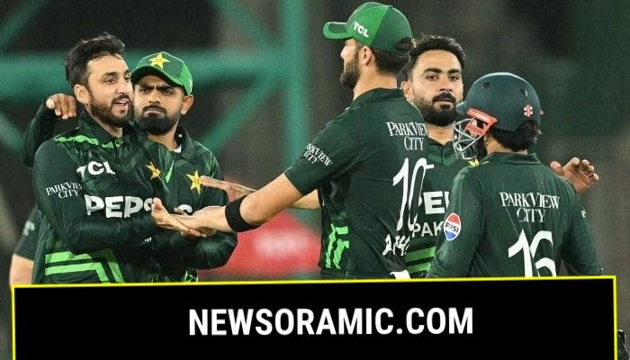 Salman Agha and Shaheen Afridi celebrate the fall of a wicket alongside their teamates, February 14, 2025. — AFP