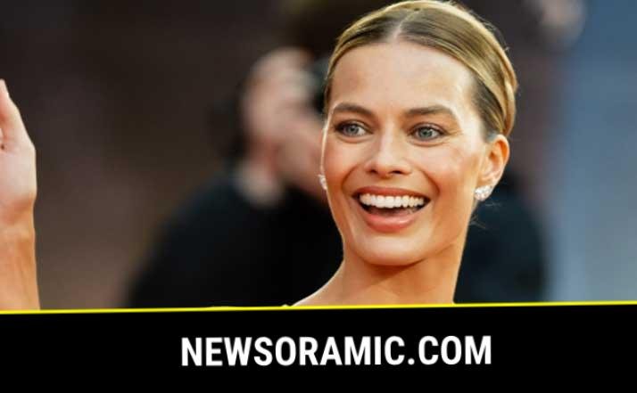 Margot Robbie honors Armani legacy with daring dress days after designers funeral