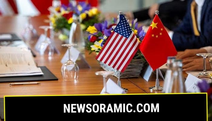 The American and Chinese flags are photographed on the negotiating table, during a bilateral meeting between the United States and China, in Geneva, Switzerland, May 10, 2025.—Reuters