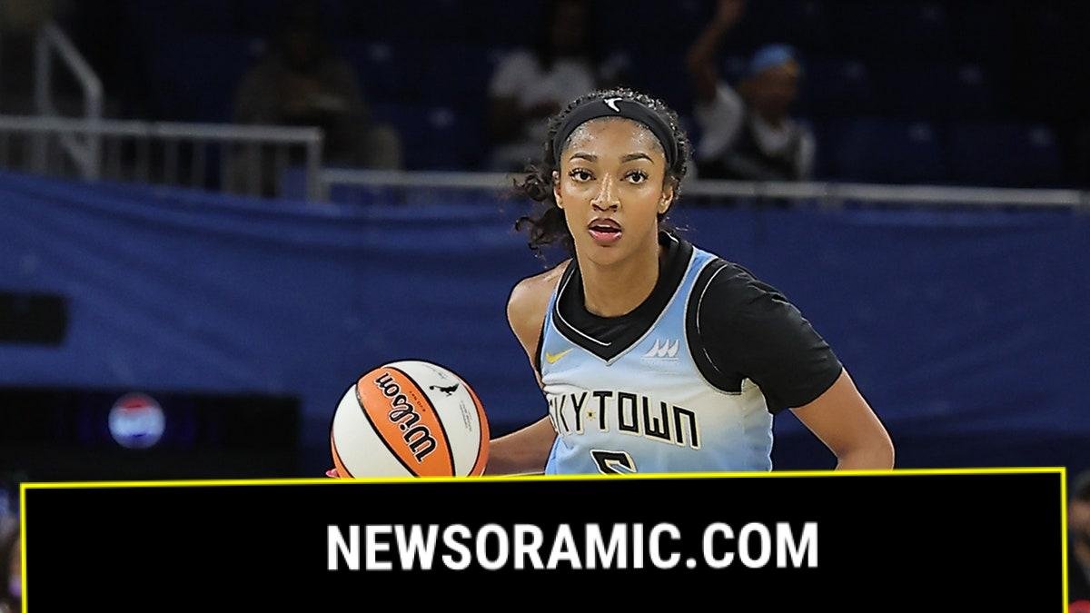 Angel Reese dribbling