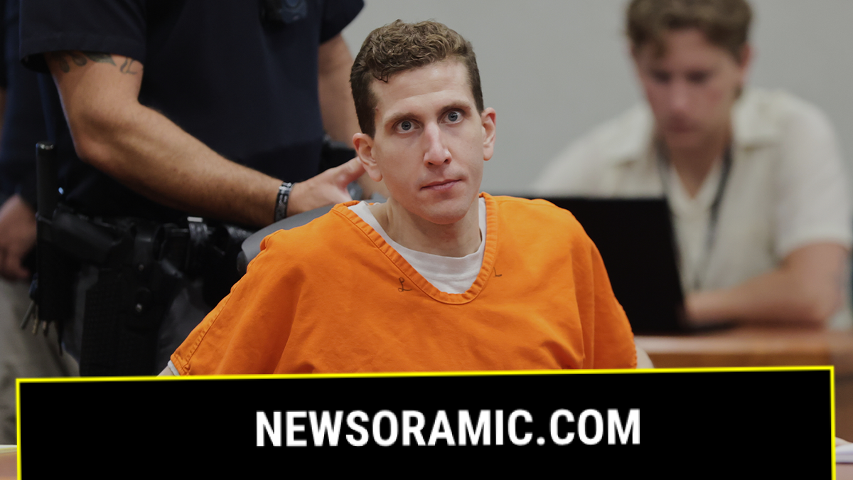 Bryan Kohberger adjusts his seat at the Ada County Courthouse, wearing an orange jail jumpsuit over a white T-shirt
