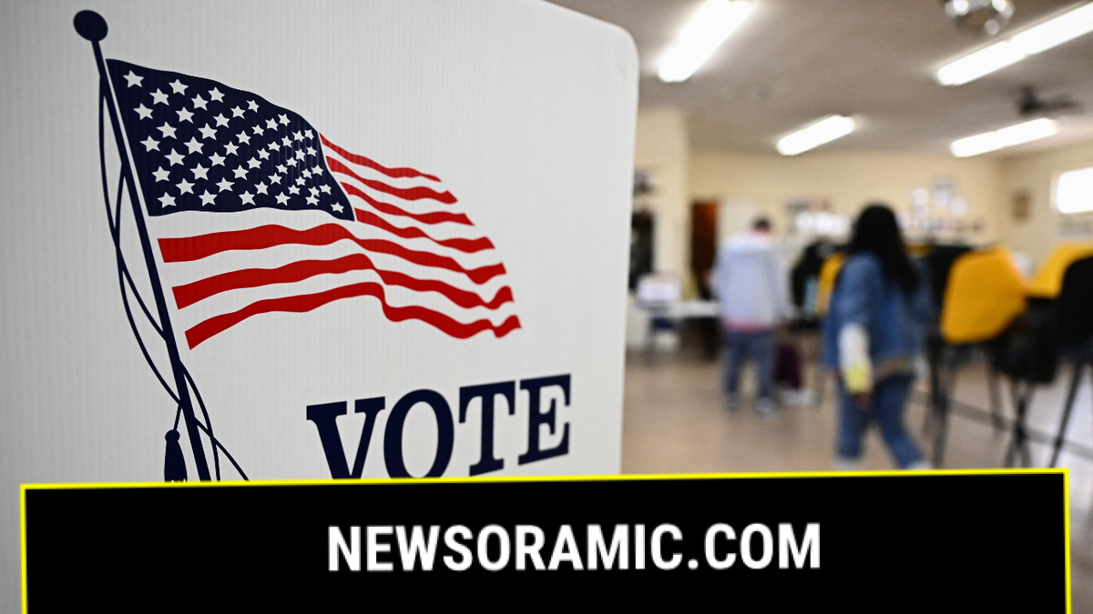 Voting booth with American flag