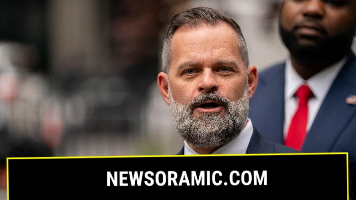 Cory Mills speaks during press conference