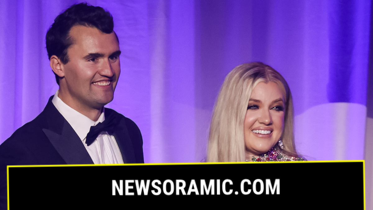 Charlie Kirk smiling next to his wife