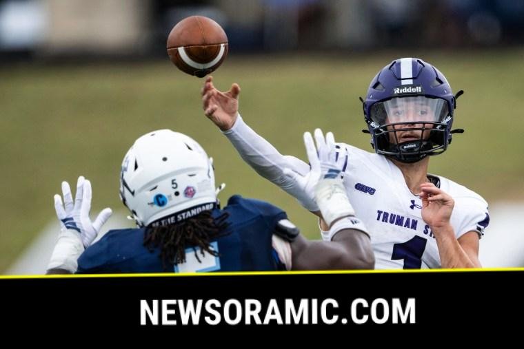 Dylan Hair throws a football