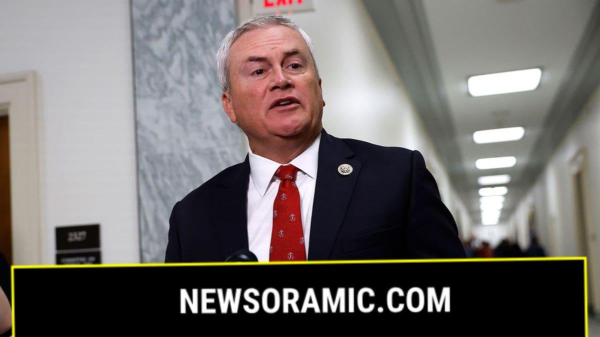 James Comer at microphones