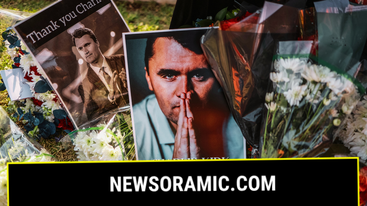 A view of flowers and photographs laid by mourners outside the U.S. Embassy in Pretoria