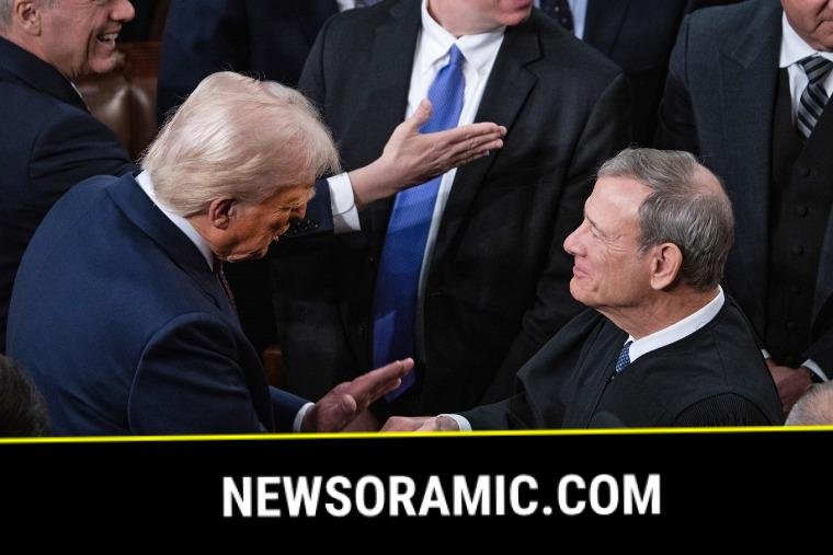 President Donald Trump greets Chief Justice John Roberts