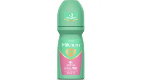 Mitchum A green and pink bottle of Mitchum powder-fresh roll-on deodorant.