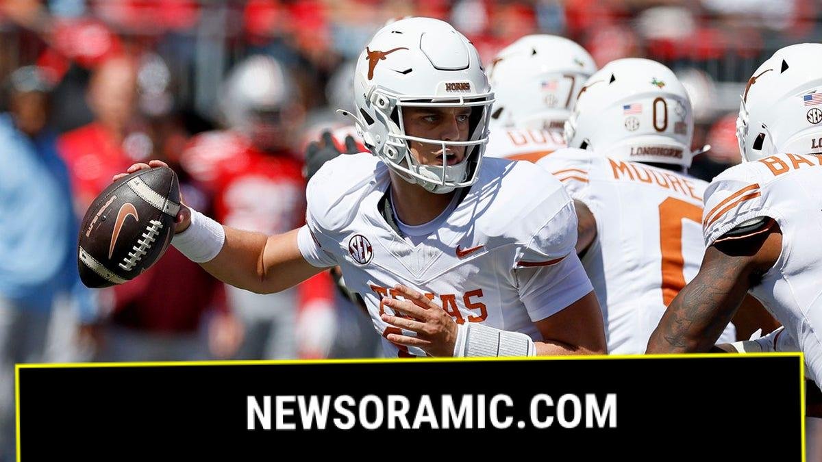 Arch Manning drops back to pass