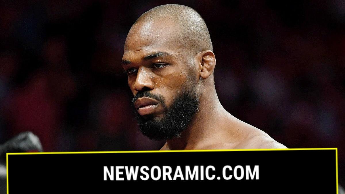 Jon Jones walks in octagon