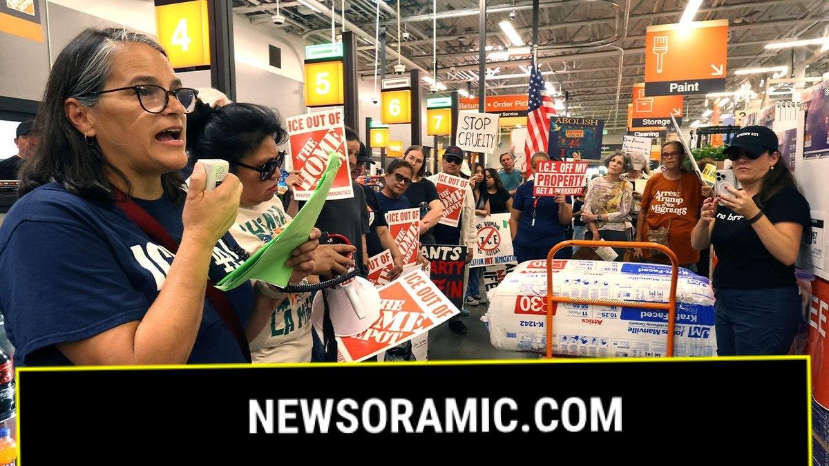 Protesters demonstrate inside of a Home Depot.