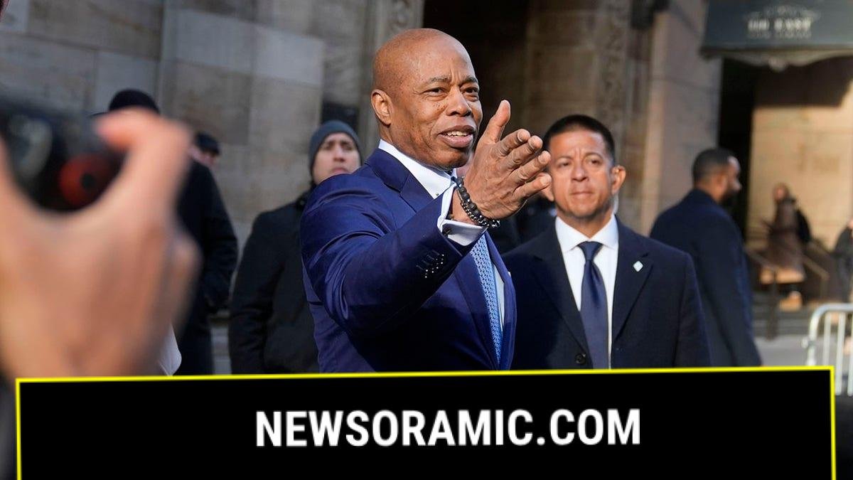 Adams leaving NYC event