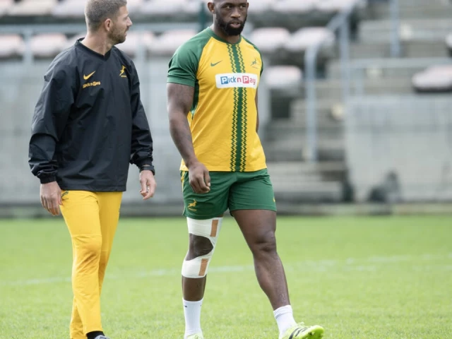 south africa s siya kolisi with his leg in heavy strapping last month in cape town photo afp