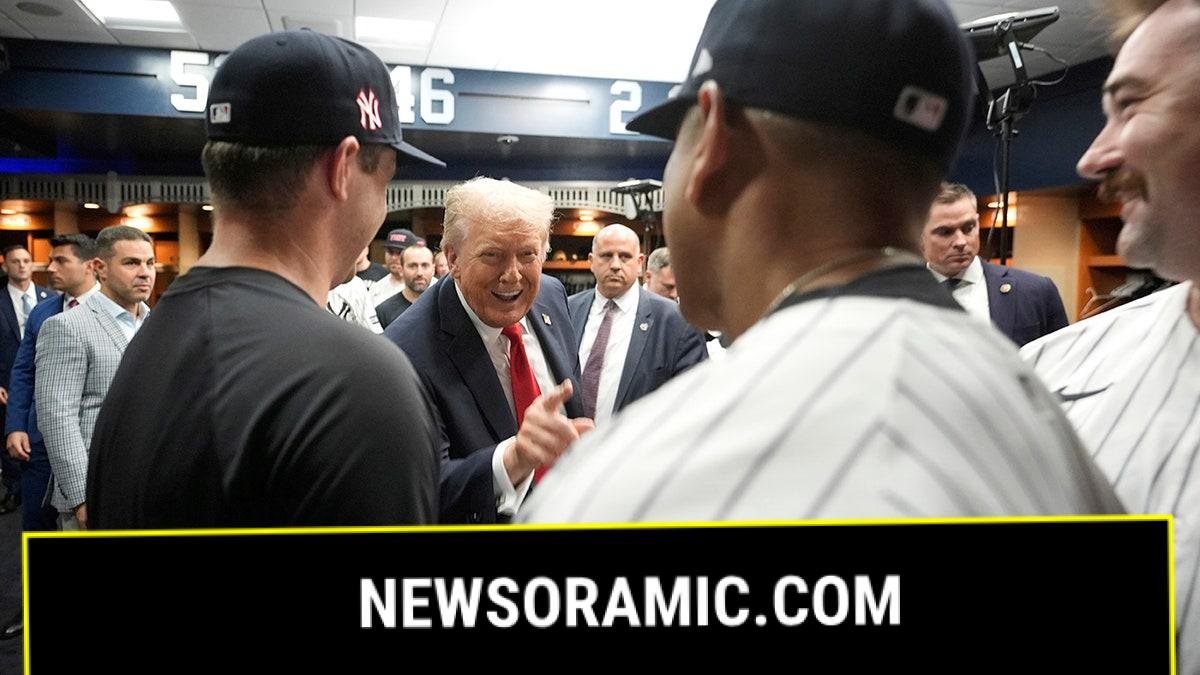 Donald Trump talks to Yankees players