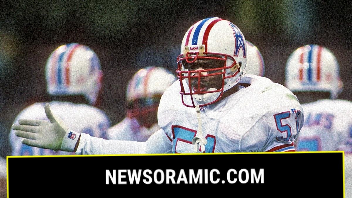 Micheal Barrow motions to the sideline