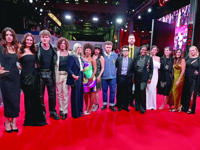 cast and crew including gala gordon lily james pedro correa rachel lee goldenberg myha la mary neely ian colletti aidan laprete and jennifer gibgot attend the premiere of swiped during the 2025 toronto international film festival at roy thomson hall photo afp