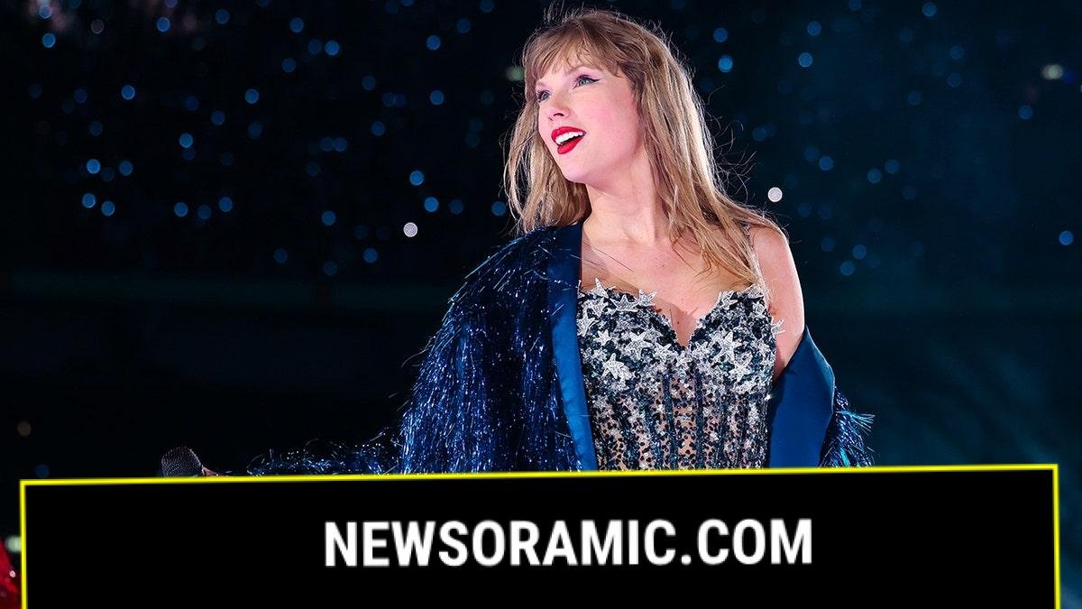 Taylor Swift in a blue and silver jumpsuit while performing on night 2 of her Eras Tour stop in London, in August 2024.