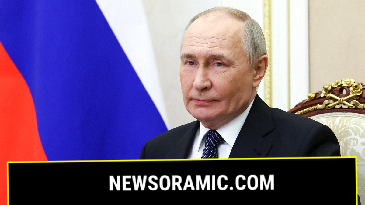 Russian President Vladimir Putin listens during a meeting at the Kremlin